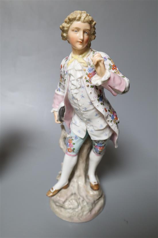 Two pairs of Continental porcelain figures of a man and woman, 15cm and 26cm